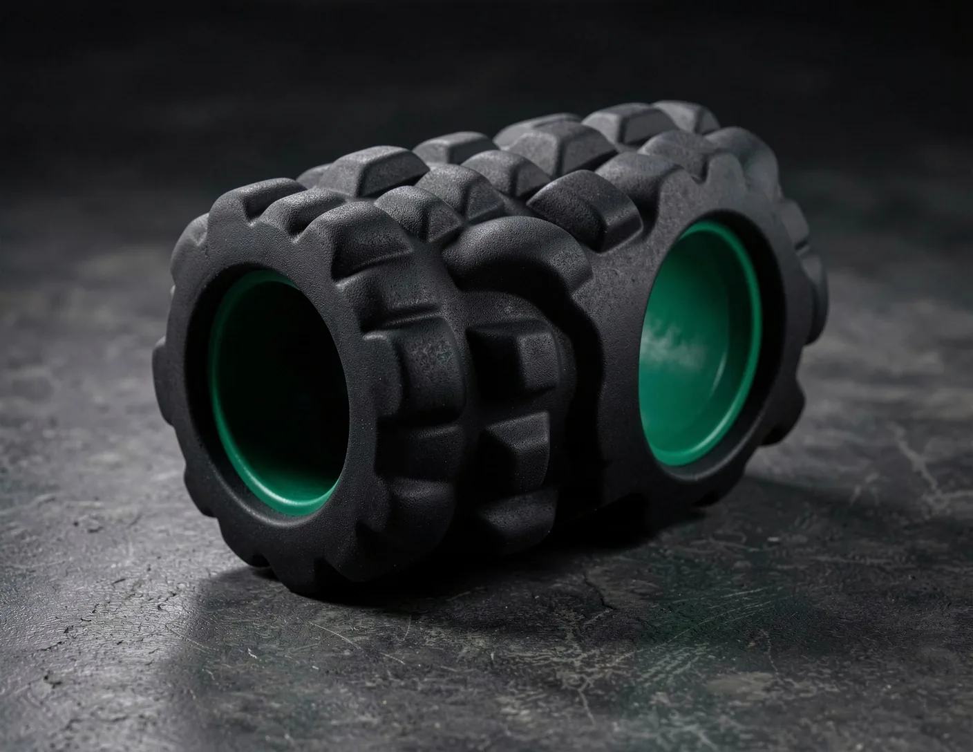 FlexFlow premium foam roller on dark studio surface